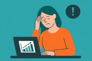 Illustration af stresset medarbejder foran computer med stigende graf – symbol på vigtigheden af løbende trivselsmålinger for at fange stress i tide